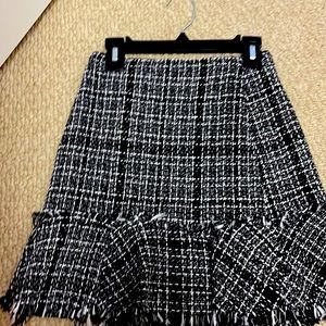 This is a black and white skirt never been worn